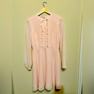 A lovely baby pink dress. Perfectly fitted yet comfortable